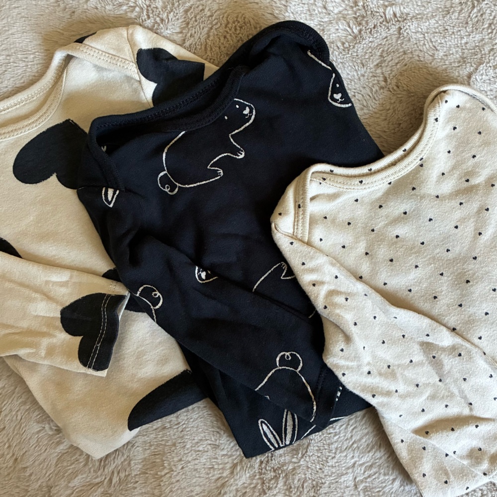 Set of Three Baby Onesies in Black and Cream